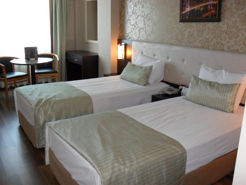Palmcity Hotel Akhisar Quarto foto